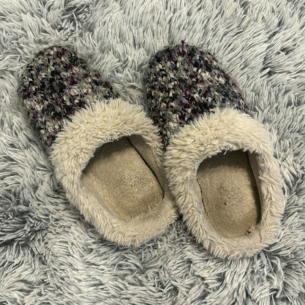 Worn house slippers